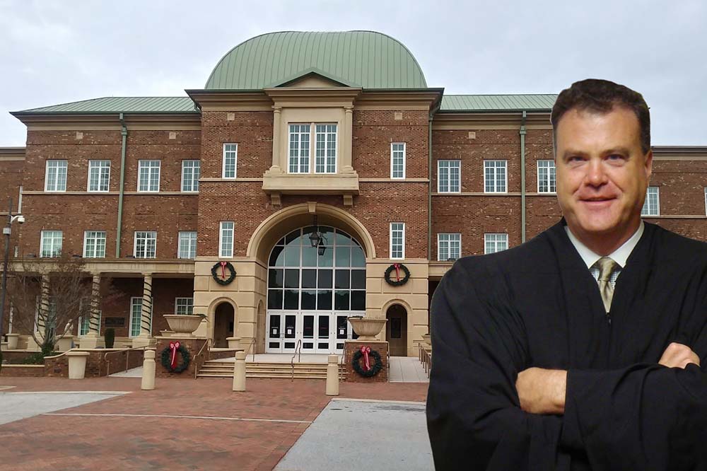 christopher charles edwards in front of Fayette County courthouse